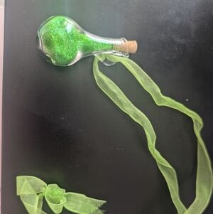 Green "fairy dust" glitter ribbon necklace